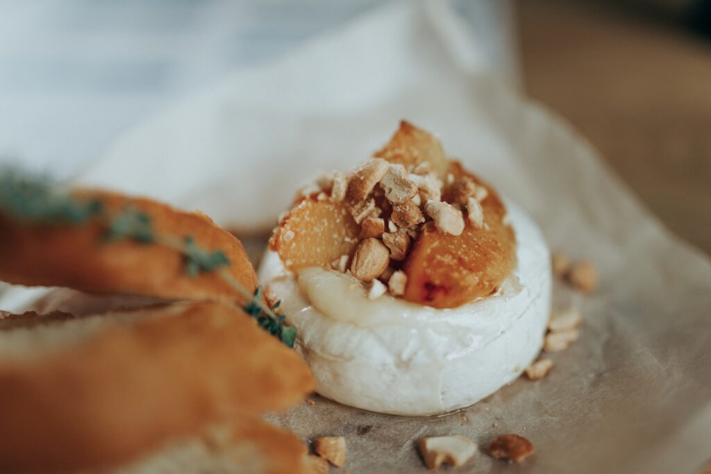 white and brown bread with white cream on top