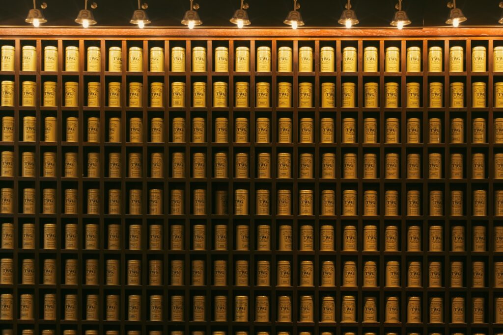 Wall of gold bars illuminated by spotlights